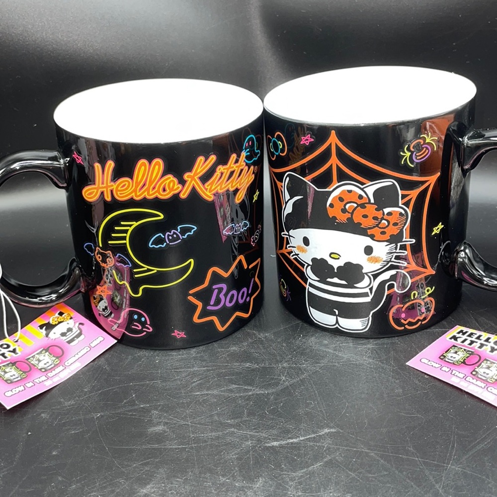 (2) Glow in the dark Hello Kitty Halloween coffee cups/mugs